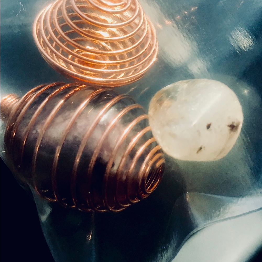 Copper-coiled oval shaped pendulum-purple crystal